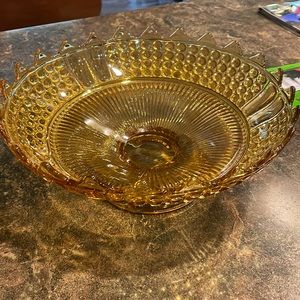 10.5 wide x 4.5 tall vintage amber daisy and button scalloped footed bowl.